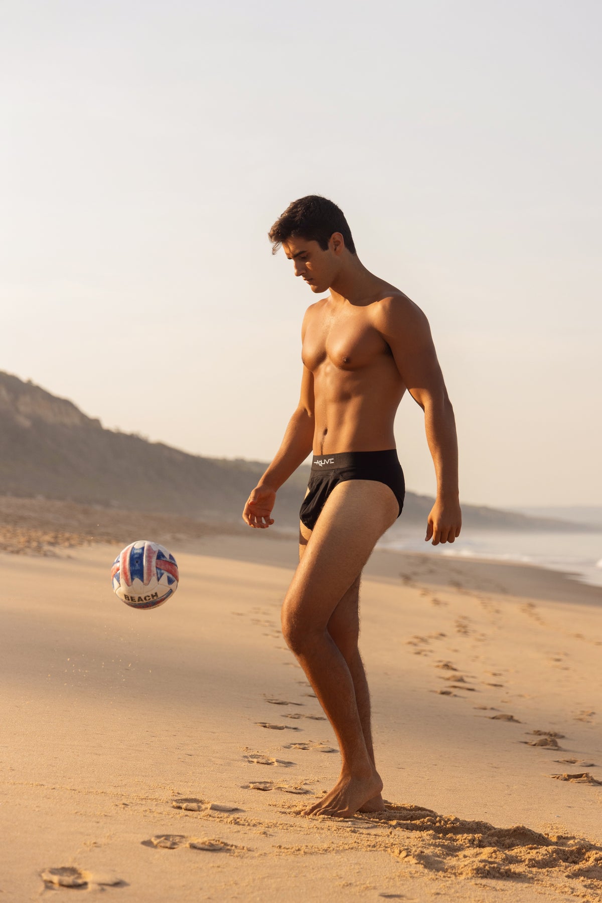 Man wearing the black Aquve Cotton Brief.